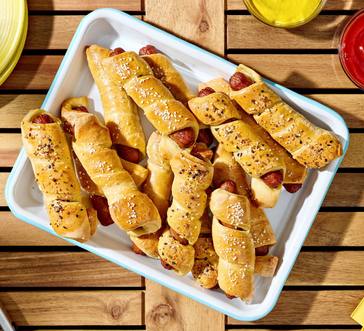 Pretzel Hot Dogs with Cheese Dipping Sauce image