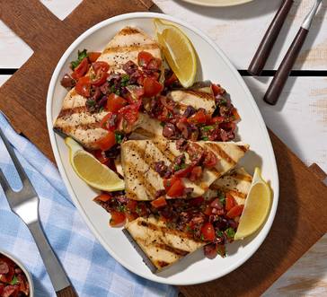Grilled Swordfish with Tomato-Olive Relish and Couscous image