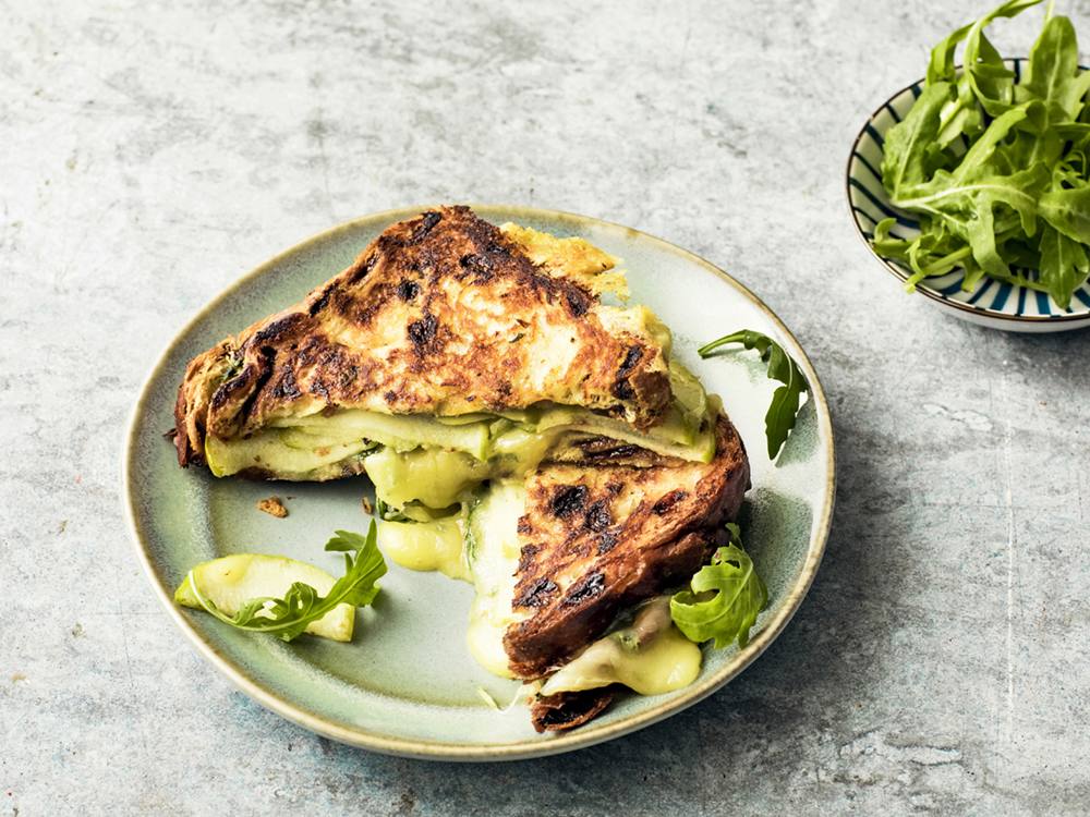 For lovers of sweet and savory combos, this sandwich checks off all the boxes. Raisin-studded cinnamon bread is balanced by sharp Gouda cheese, fresh arugula, and crunchy tart apples.