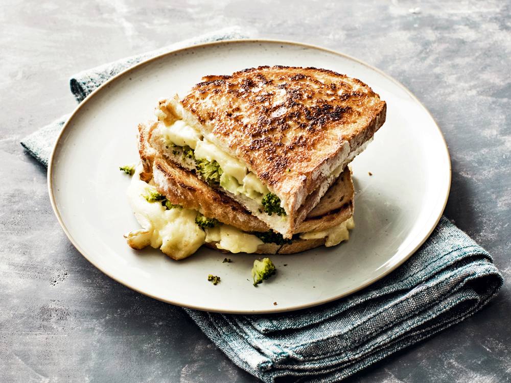 Tucking veggies into this cheesy sandwich is a great way to up its nutrition while still enjoying one of your favorite comfort foods.
